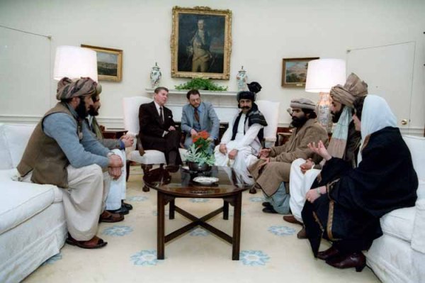 President Reagan meeting with Afghan Mujahideen leaders in the Oval Office in 1983.